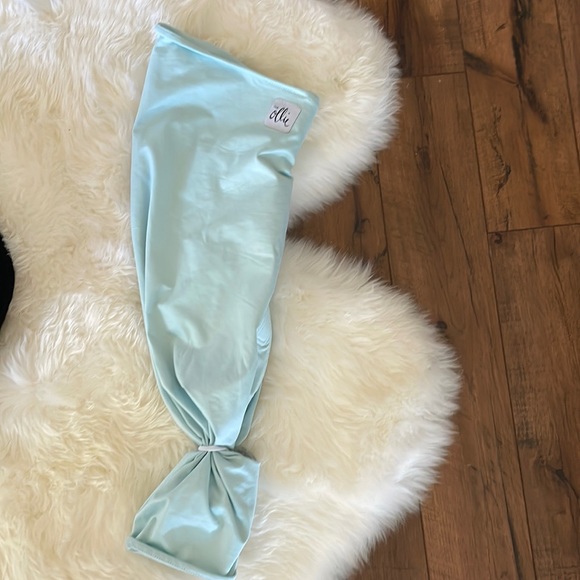 New never used ollie swaddle. In perfect condition